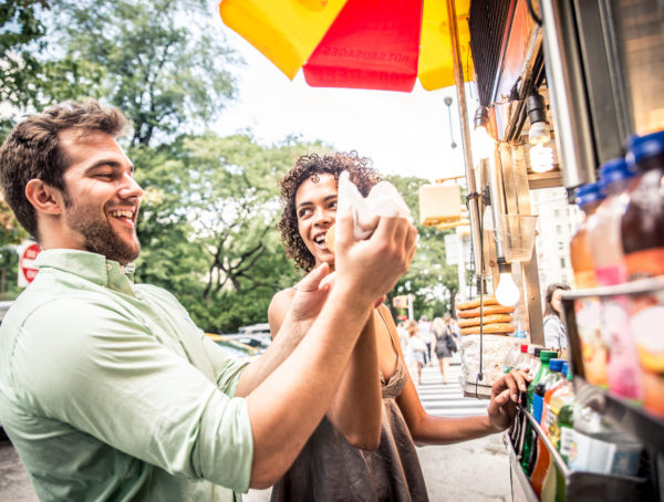 couple at hot dog truck.