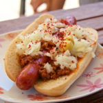 Hot dog with inions slice.